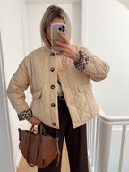 Women's quilted jacket with leopard-print cuffs and button front