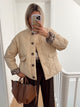 Women's quilted jacket with leopard-print cuffs and button front