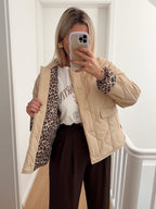 Women's quilted jacket with leopard-print cuffs and button front