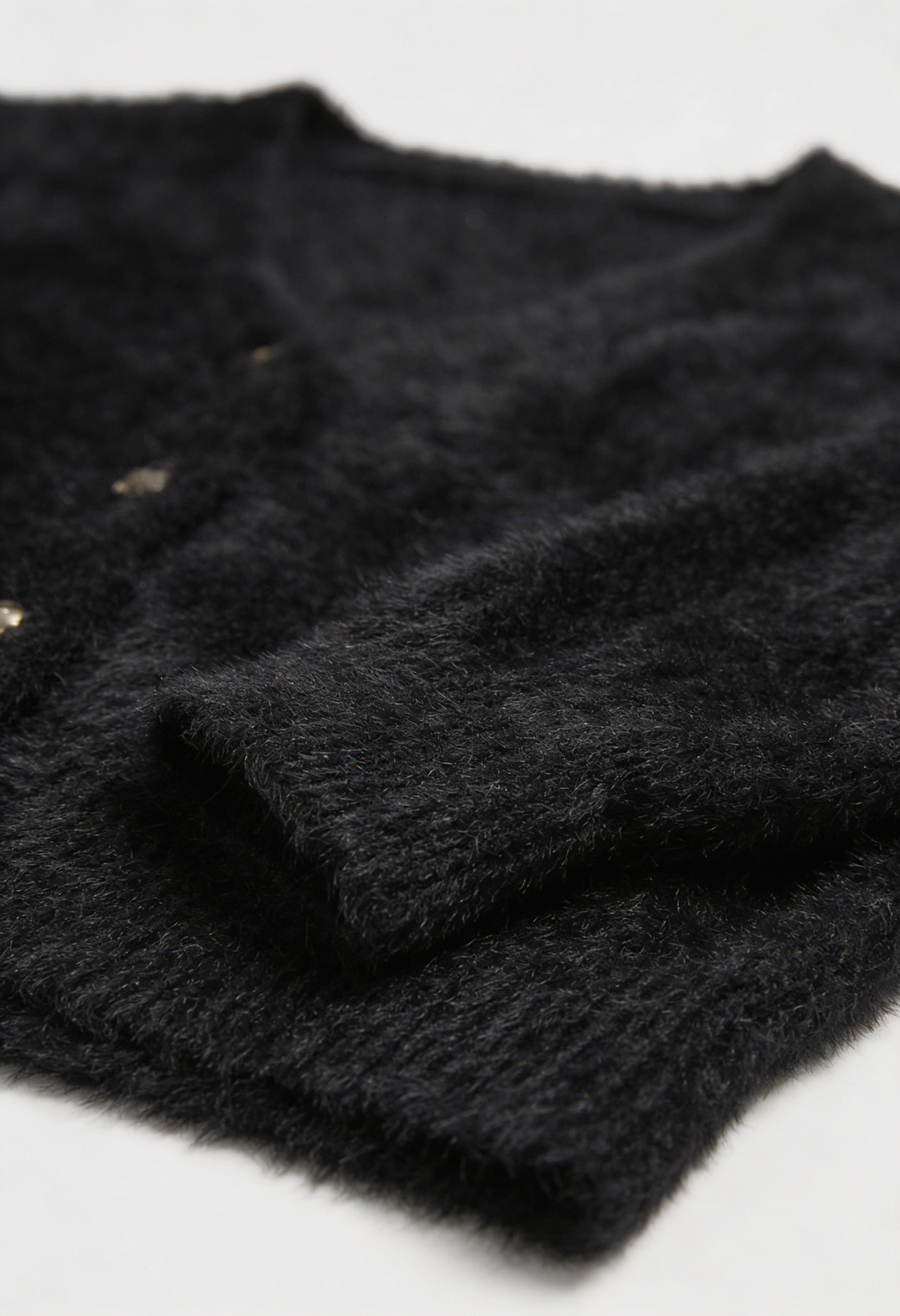 Women's black fuzzy cropped cardigan with V-neck and gold-tone buttons