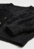 Women's black fuzzy cropped cardigan with V-neck and gold-tone buttons