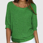 Women's textured knit pullover with round neckline and three-quarter sleeves