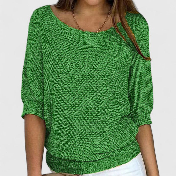 Women's textured knit pullover with round neckline and three-quarter sleeves
