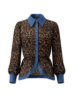 Women's leopard print blouse with blue contrast trim and long sleeves