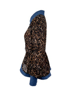 Women's leopard print blouse with blue contrast trim and long sleeves