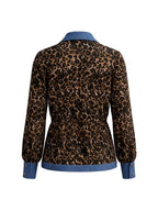 Women's leopard print blouse with blue contrast trim and long sleeves