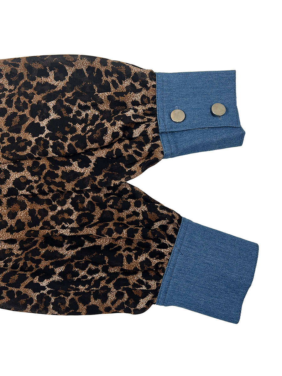 Women's leopard print blouse with blue contrast trim and long sleeves