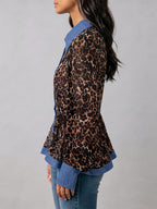 Women's leopard print blouse with blue contrast trim and long sleeves
