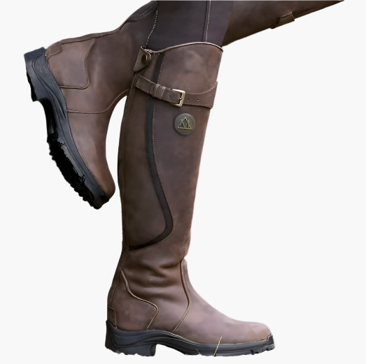 Women's tall riding boots with buckle straps, panelled shafts and flat textured soles
