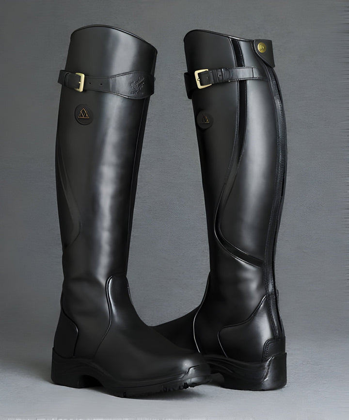 Women's tall riding boots with buckle straps, panelled shafts and flat textured soles