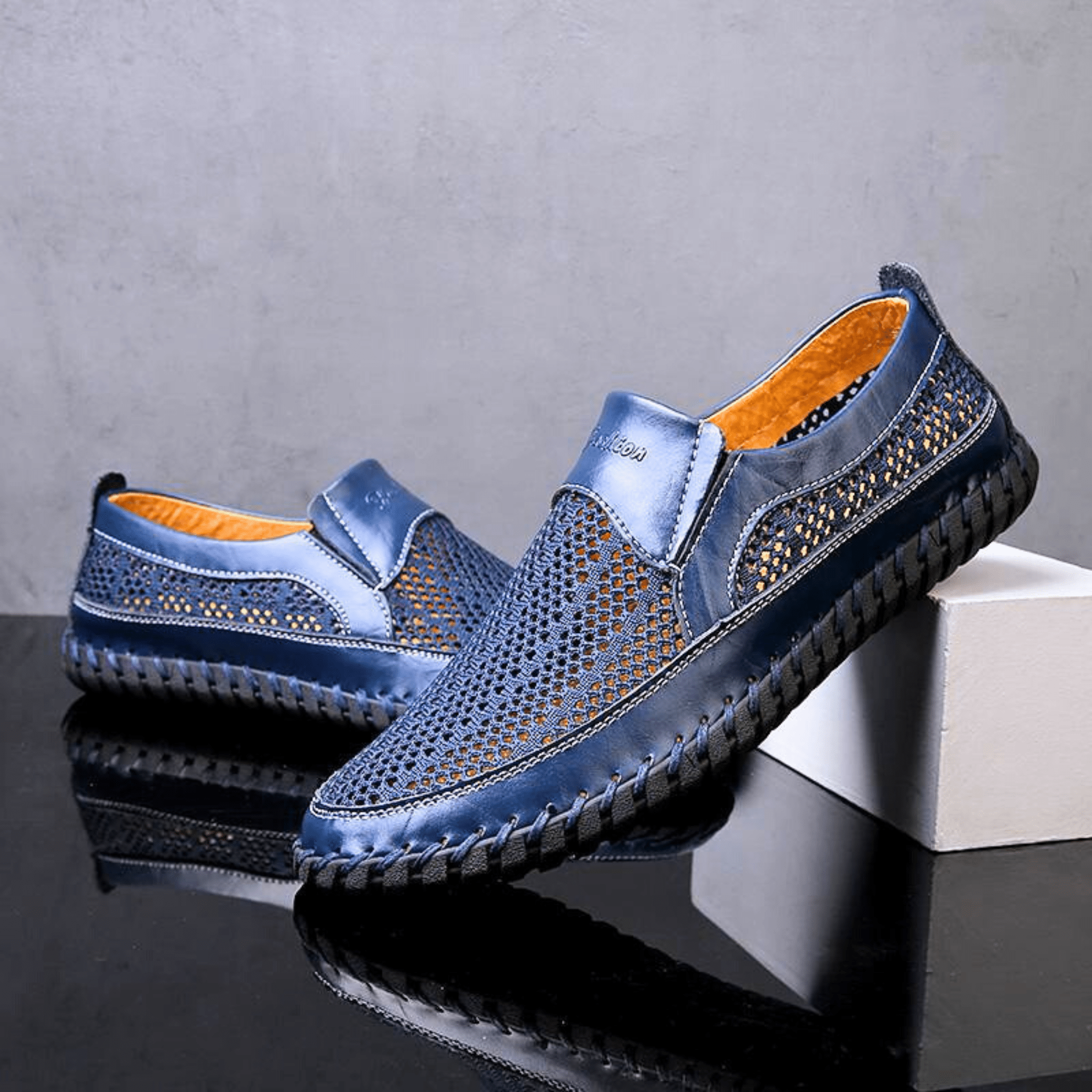 Woven slip-on loafers with moc toe and contrast stitched sole