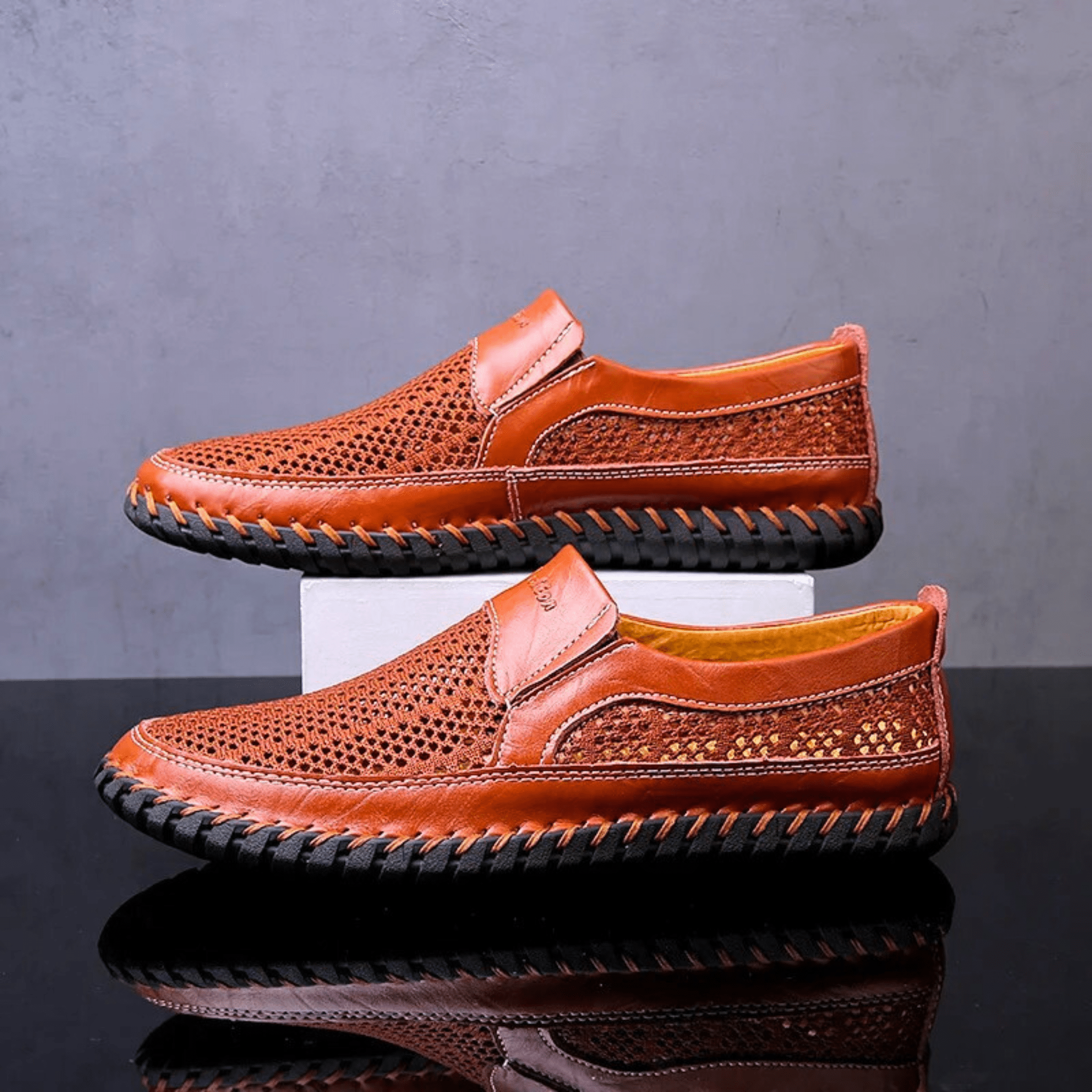 Woven slip-on loafers with moc toe and contrast stitched sole