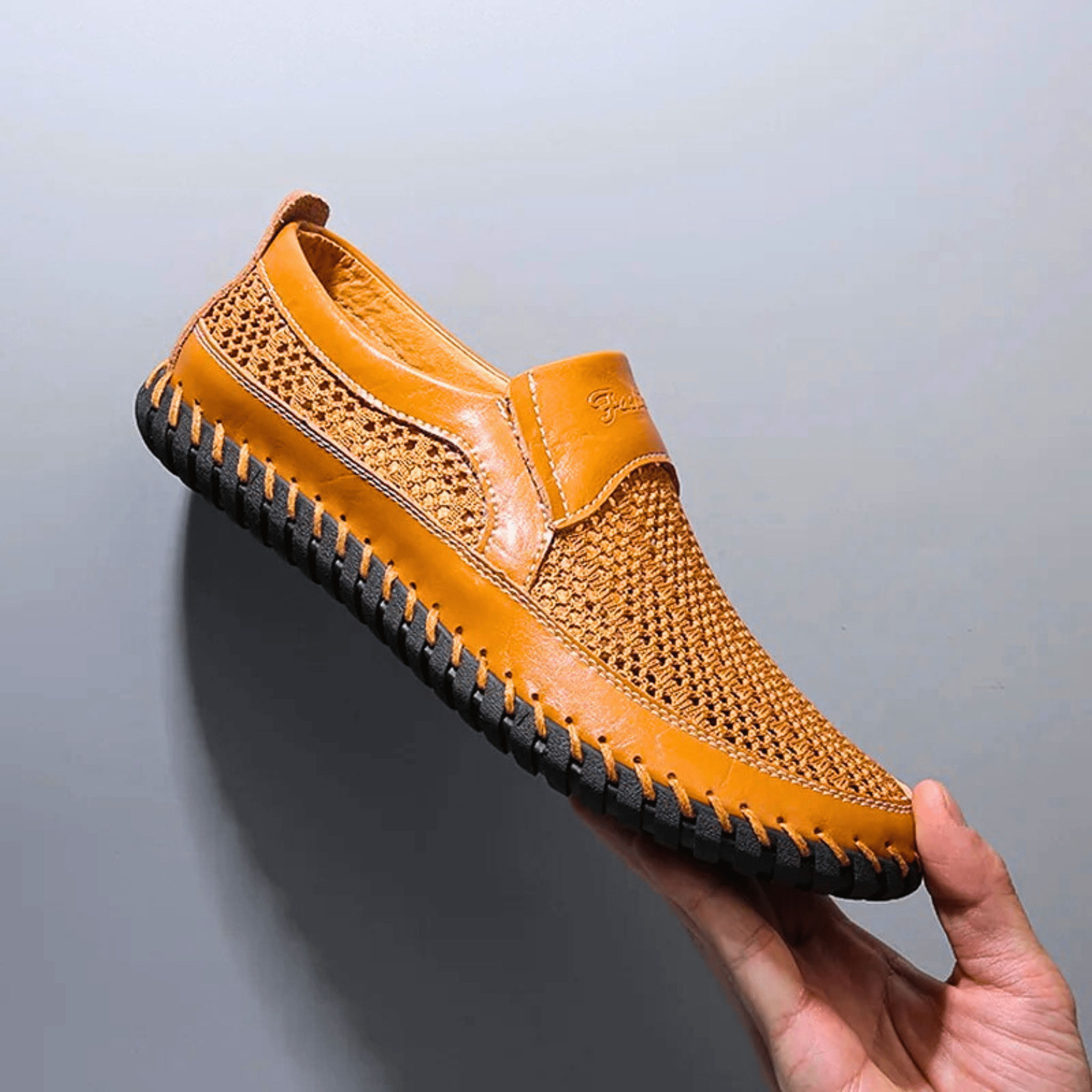 Woven slip-on loafers with moc toe and contrast stitched sole
