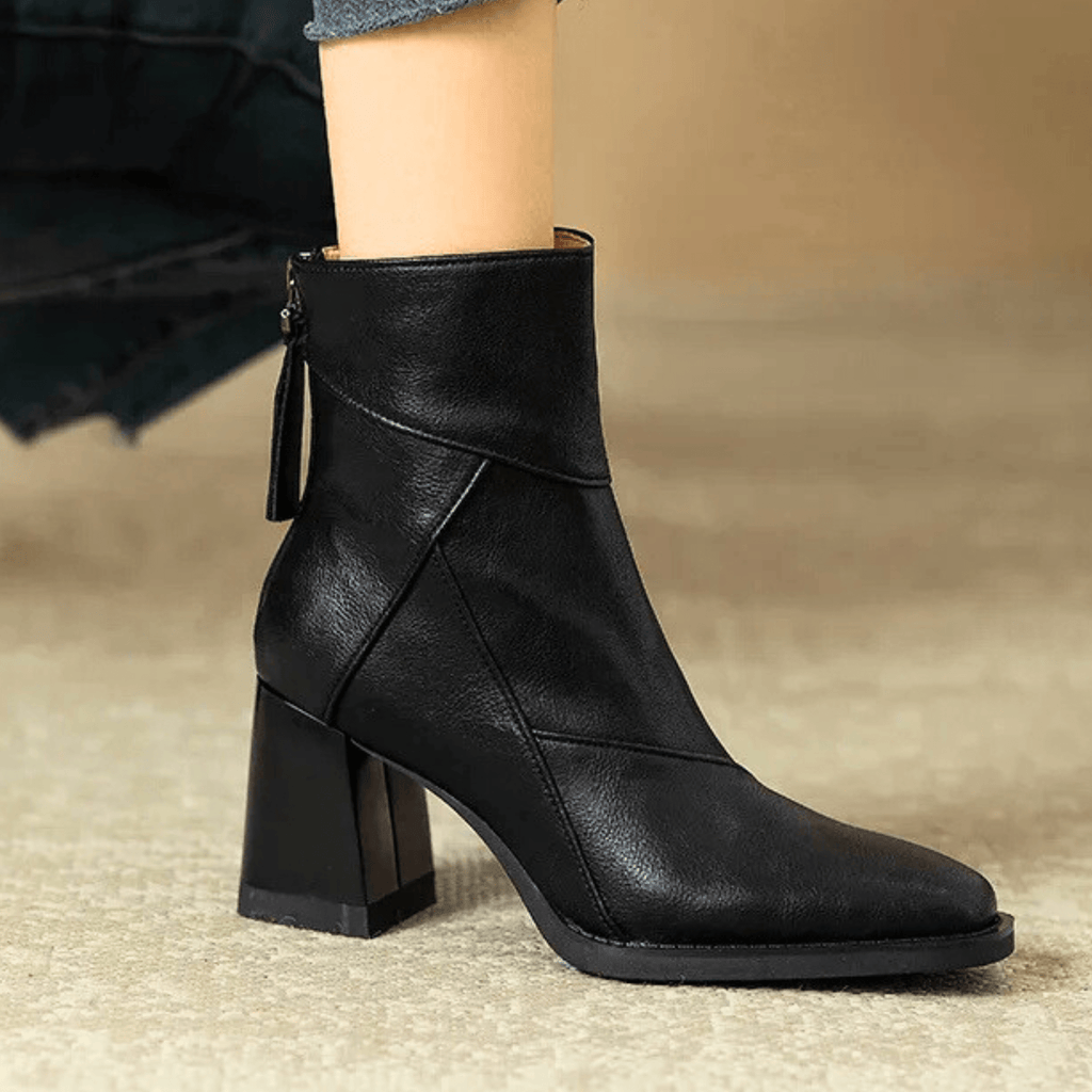 Women's pointed toe ankle boots with high block heel and hanging tassel detail