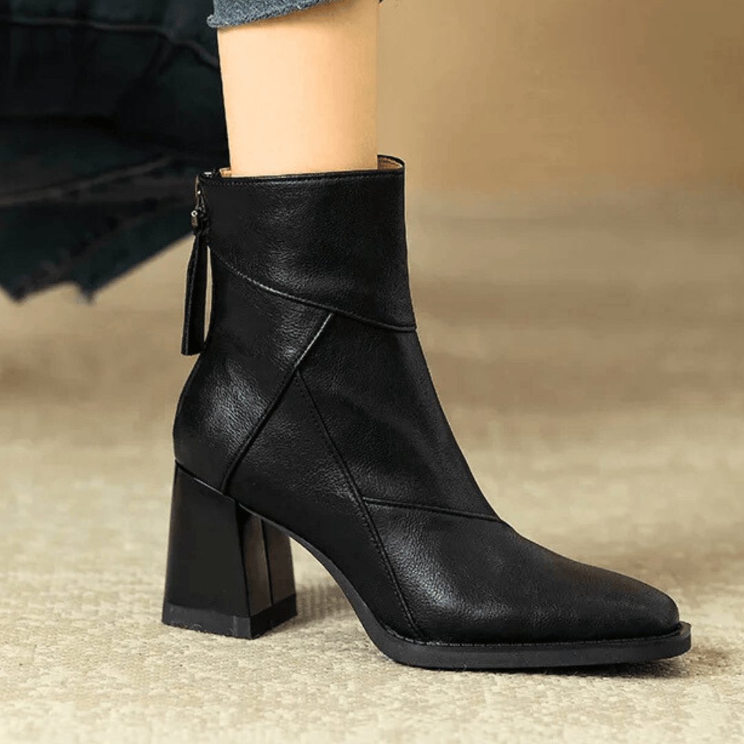 Women's pointed toe ankle boots with high block heel and hanging tassel detail