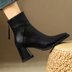 Women's pointed toe ankle boots with high block heel and hanging tassel detail