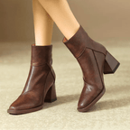 Women's pointed toe ankle boots with high block heel and hanging tassel detail