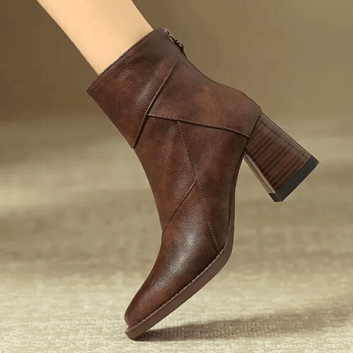 Women's pointed toe ankle boots with high block heel and hanging tassel detail
