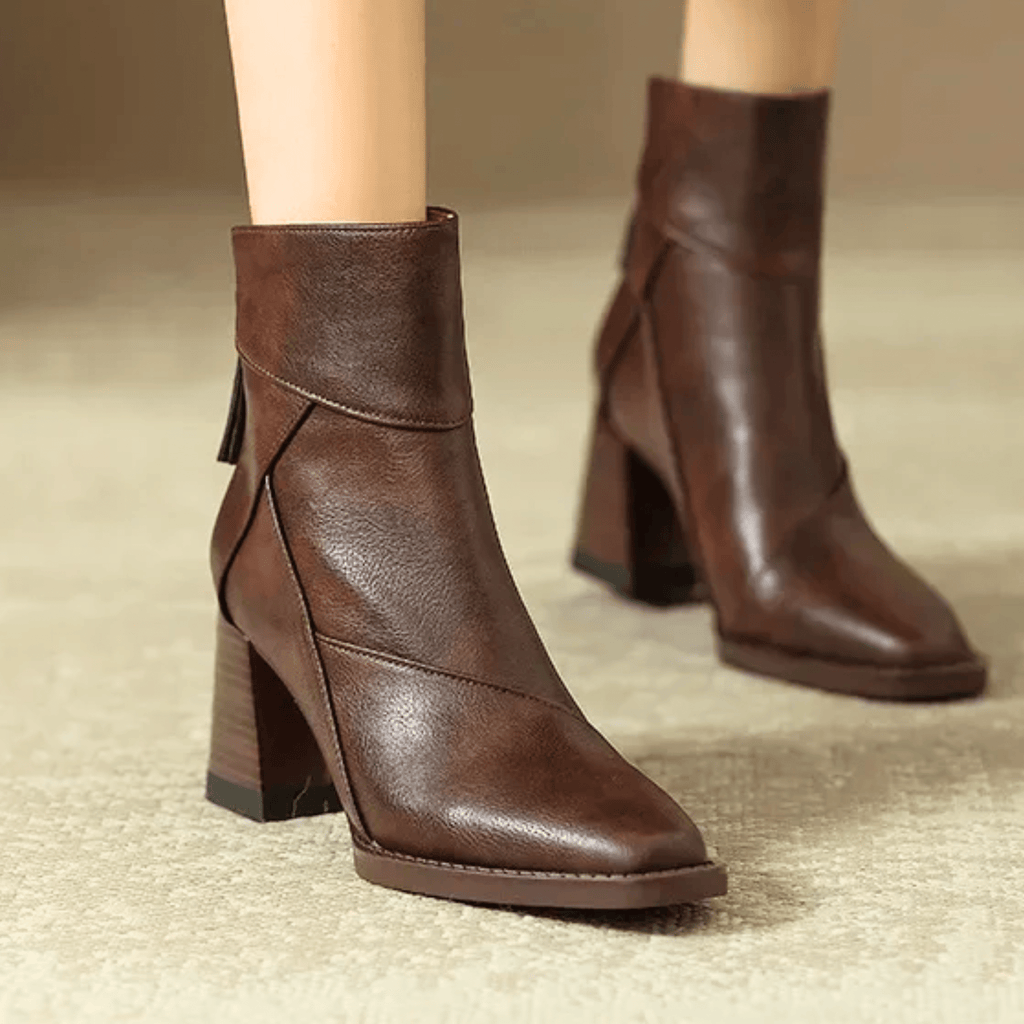 Women's pointed toe ankle boots with high block heel and hanging tassel detail
