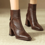 Women's pointed toe ankle boots with high block heel and hanging tassel detail