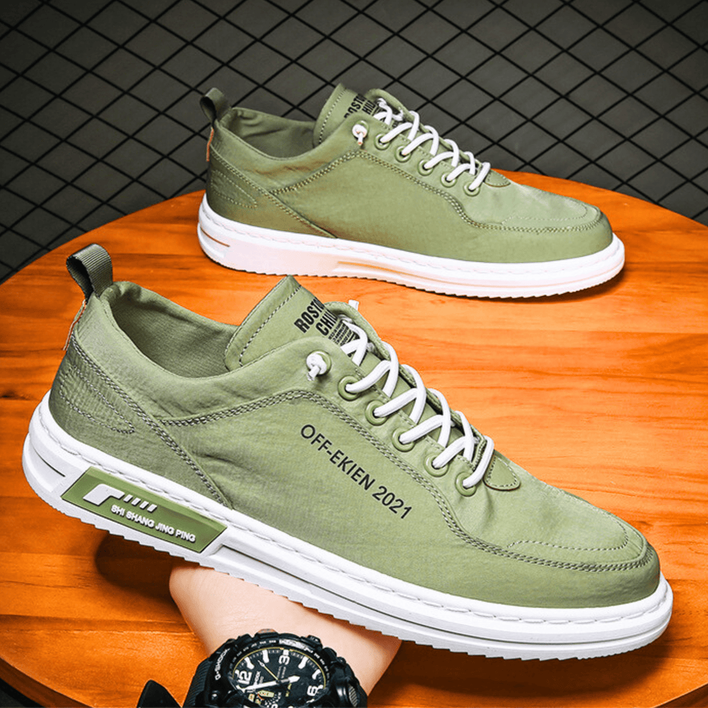 Low top lace-up sneakers with panelled upper and contrast sole