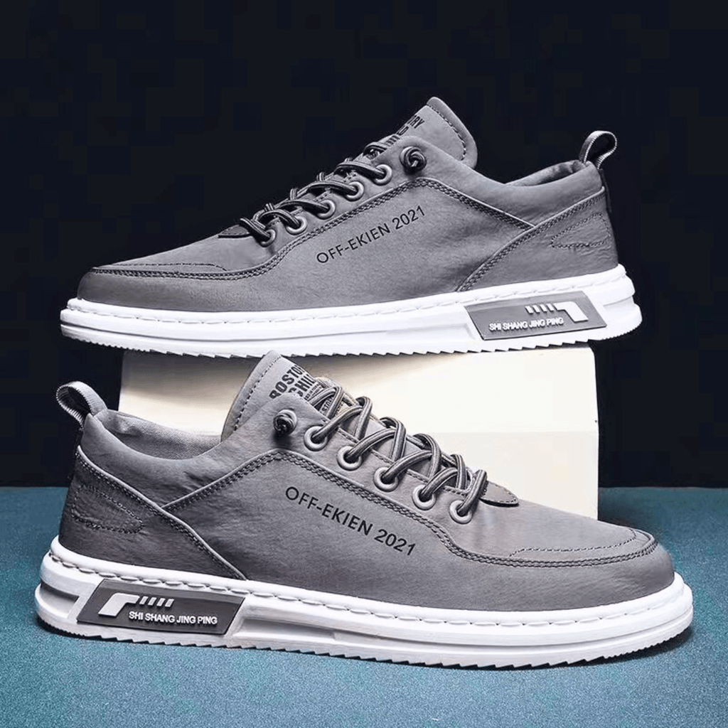 Low top lace-up sneakers with panelled upper and contrast sole