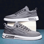 Low top lace-up sneakers with panelled upper and contrast sole