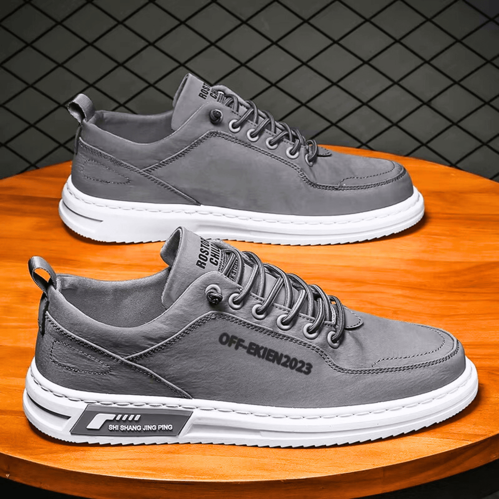 Low top lace-up sneakers with panelled upper and contrast sole