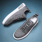 Low top lace-up sneakers with panelled upper and contrast sole