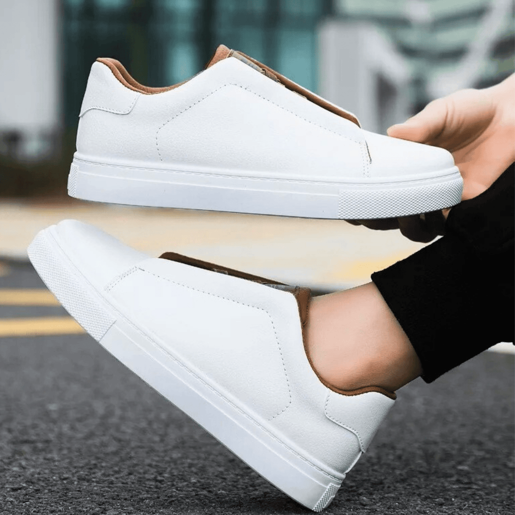 Unisex low-top panelled sneakers with lace-up front and flat sole