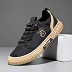 Casual lace-up sneaker with stitched panels and textured sole