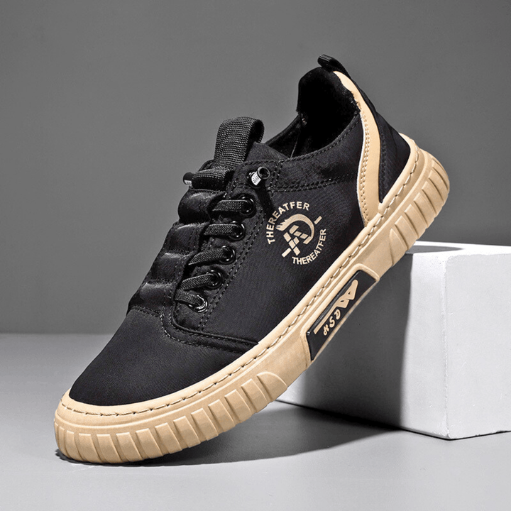 Casual lace-up sneaker with stitched panels and textured sole