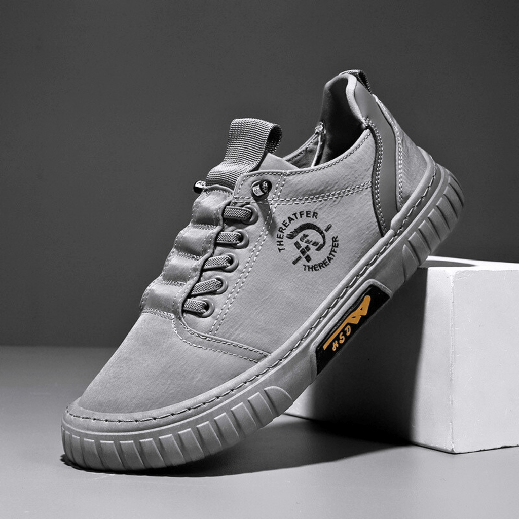 Casual lace-up sneaker with stitched panels and textured sole