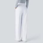 Women's high-waisted wide-leg trousers shown in multiple colours
