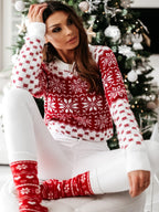 Women's red and white festive Fair Isle jumper with snowflake and reindeer motifs