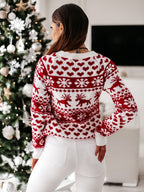 Women's red and white festive Fair Isle jumper with snowflake and reindeer motifs