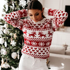 Women's red and white festive Fair Isle jumper with snowflake and reindeer motifs