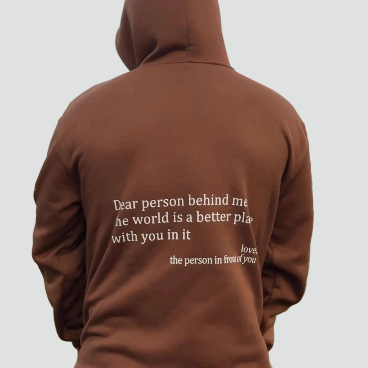 Unisex oversized hoodie with hood, kangaroo pocket and front and back text print