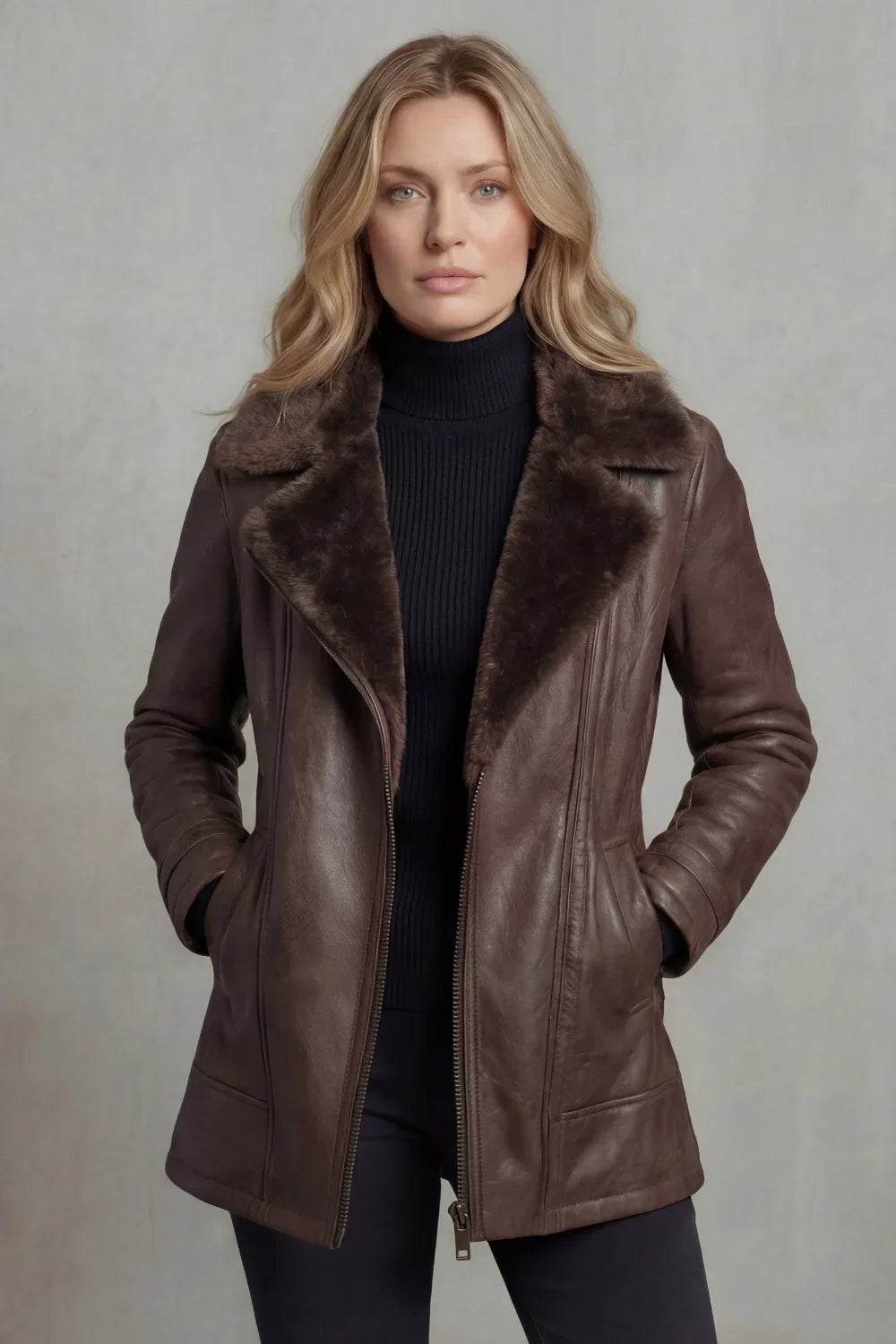 Women's brown shearling-lined jacket with wide dark collar and front zip
