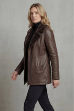 Women's brown shearling-lined jacket with wide dark collar and front zip