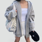Women's relaxed hooded zip-front hoodie with long sleeves and front pockets