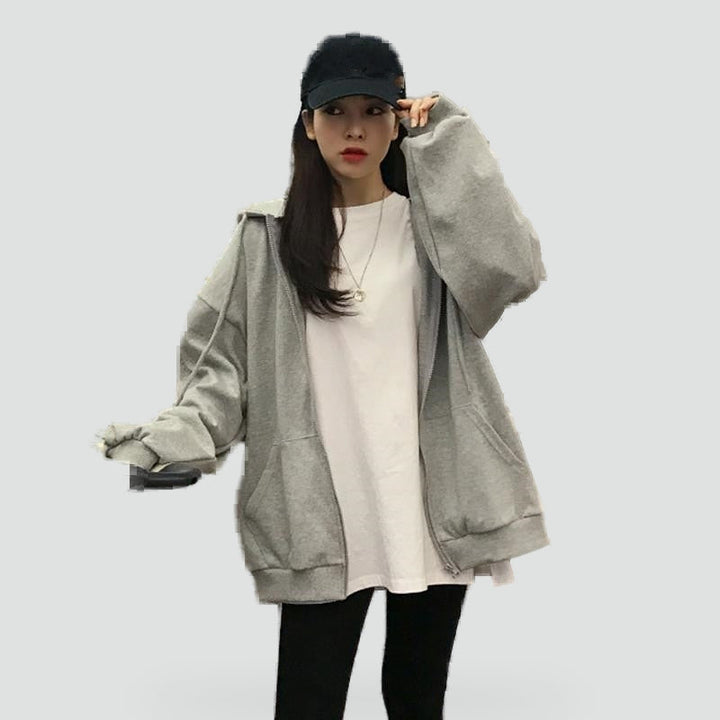 Women's relaxed hooded zip-front hoodie with long sleeves and front pockets