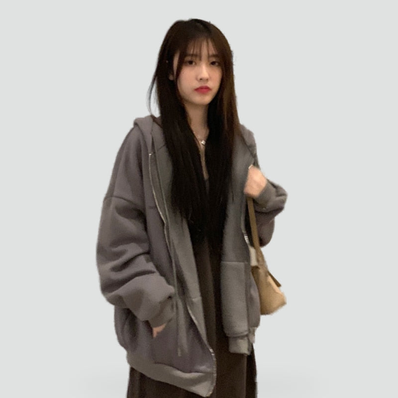 Women's relaxed hooded zip-front hoodie with long sleeves and front pockets
