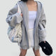 Women's relaxed hooded zip-front hoodie with long sleeves and front pockets