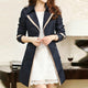 Women's long double-breasted trench coat with collared neckline and cuff tabs