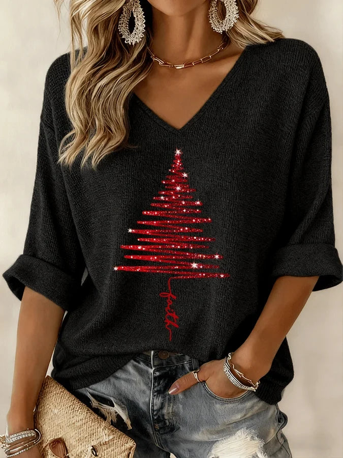 Women's black V-neck knit top with a red Christmas tree graphic