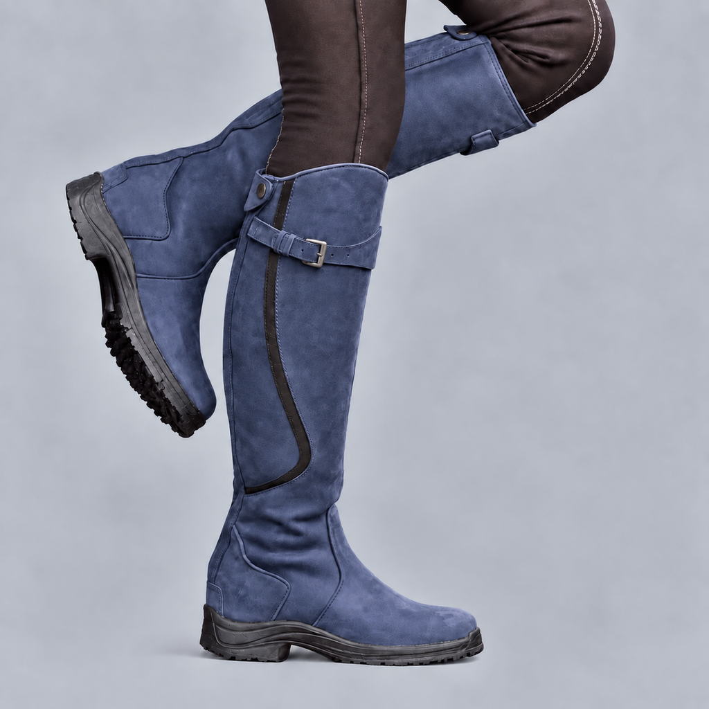 Women's tall riding boots with buckle strap, side zip and rugged tread sole