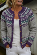 Women's grey Fair Isle cardigan with purple trim and flower buttons