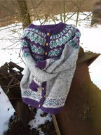 Women's grey Fair Isle cardigan with purple trim and flower buttons