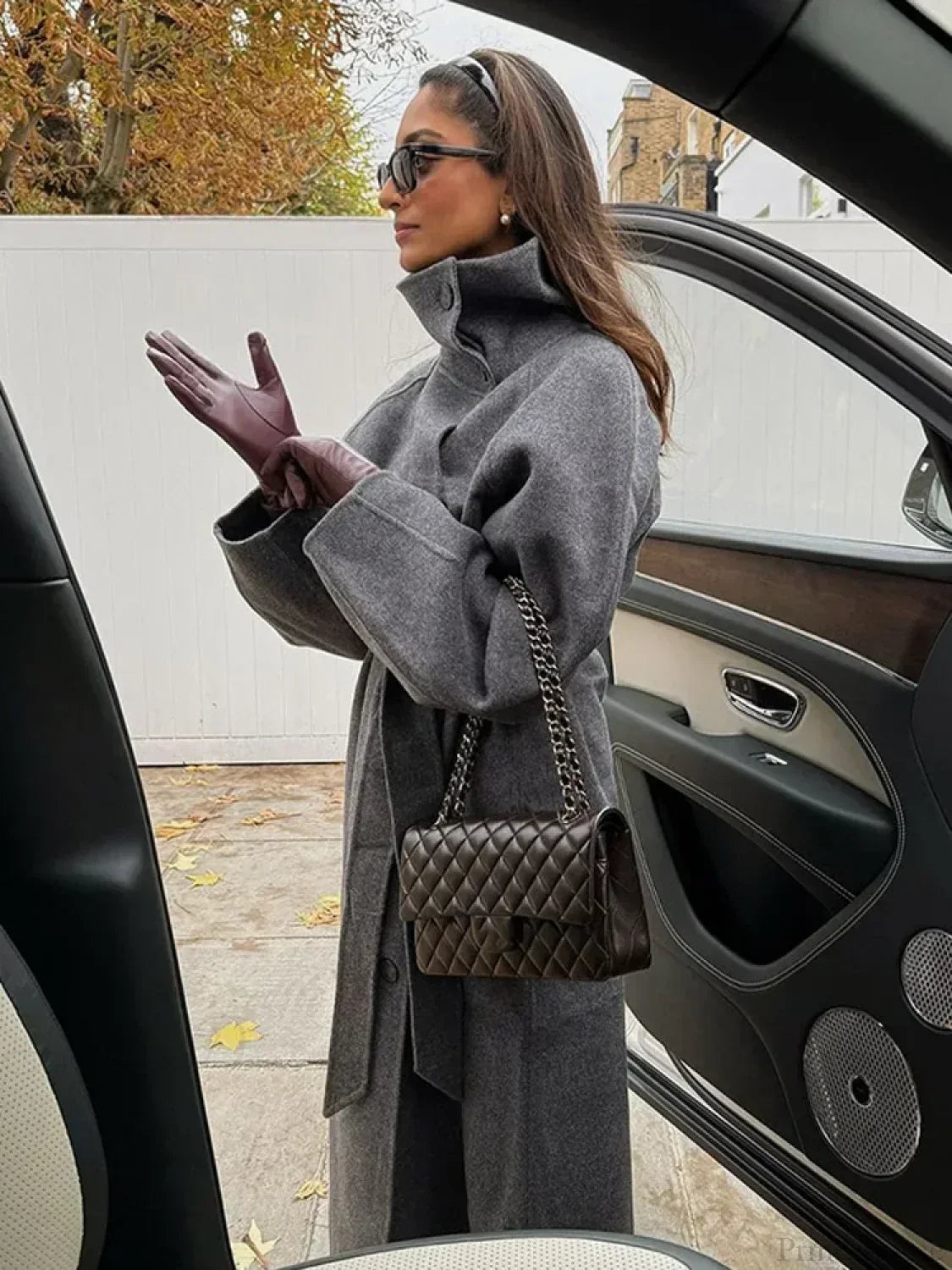 Women's grey long belted coat with stand collar and button front